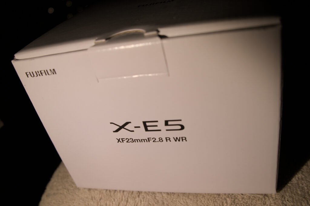 A white box that say:
Fujifilm
X-E5
XF23mmF2.8R WR